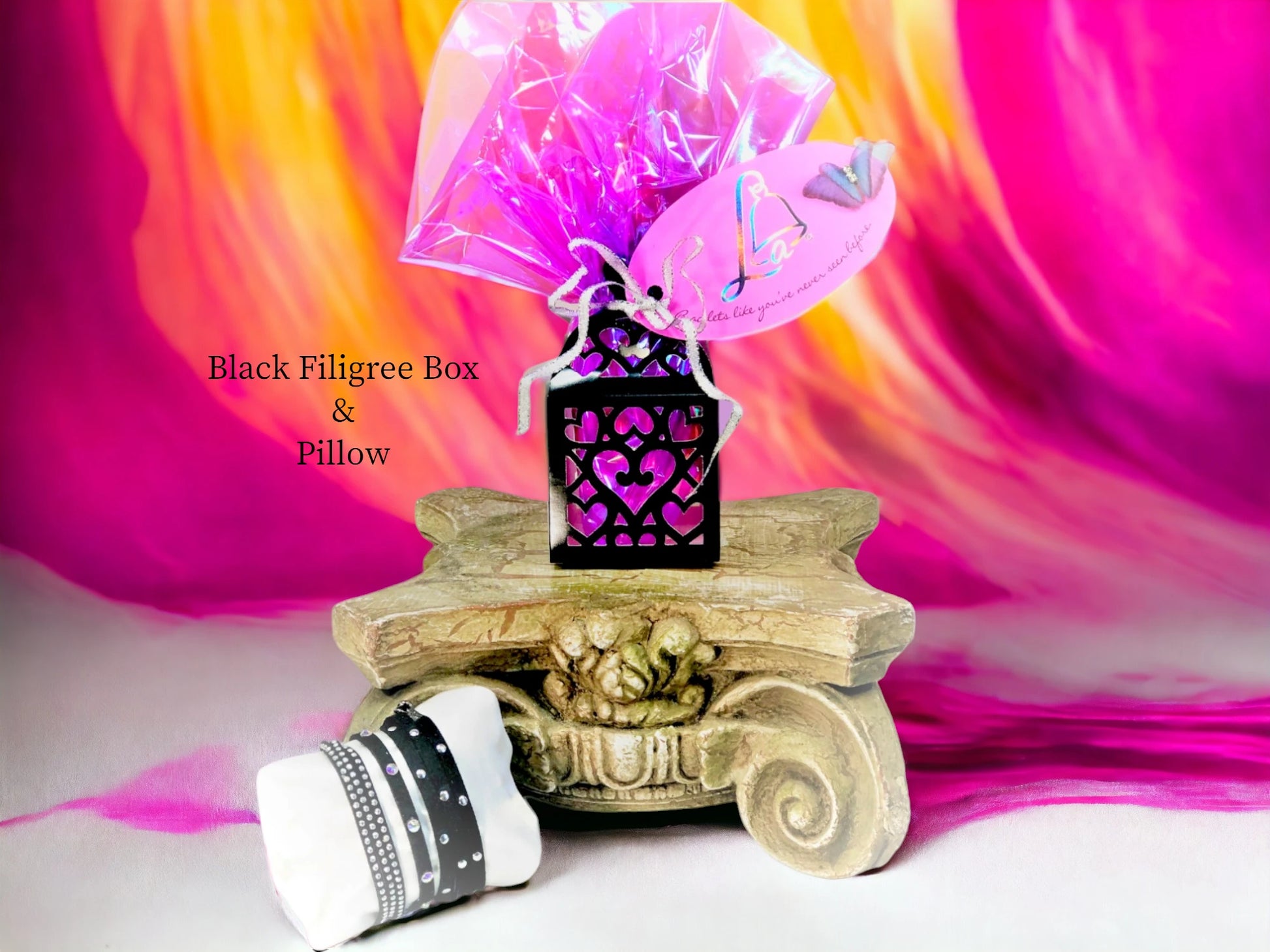 Black Filigree Box with bright purple iridescent wrap, metallic silver or gold wired ribbon, branding tag and chiffon 3-D butterfly & satin pillow $6.50