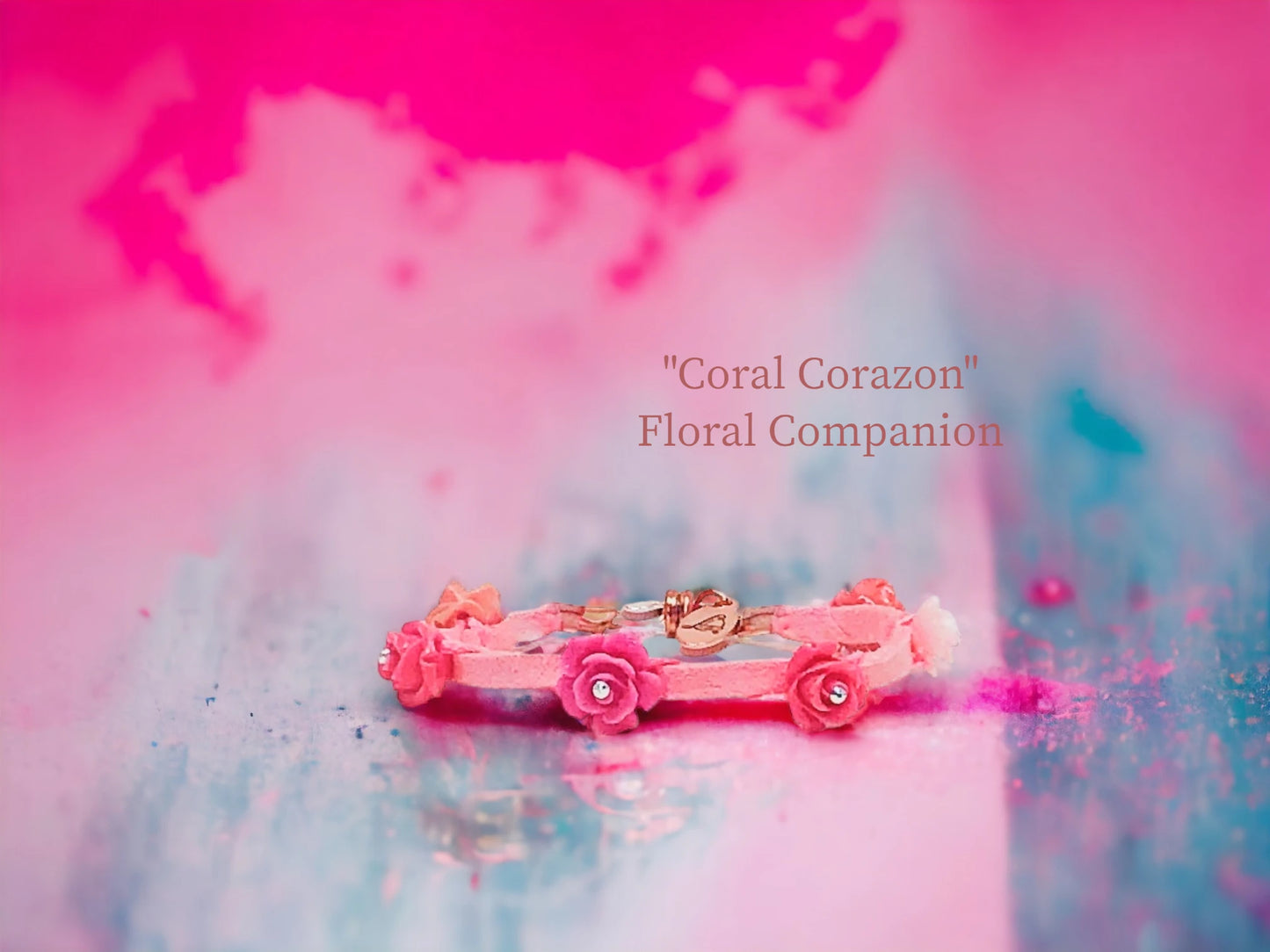 Floral Companion.= bright coral faux suede with several shades of rose beads in cascade formation$22.99