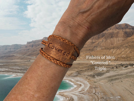 "Covered" triple wrap braided genuine leather with a genuine leather engraved bracket. A beautiful and different way to evangelize and let the world know the value of forgiveness. magnet closure. $21.99