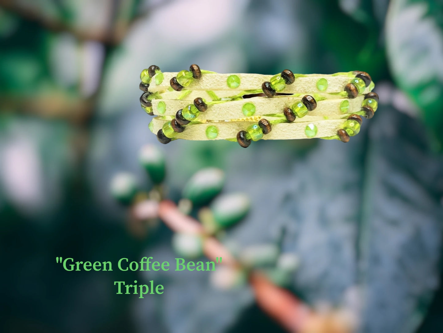 Green Coffee Bean Triple Wrap- Beautiful Buckskin colored Faux Suede with cascading Lime green Czech beads and coffee bean colored wooden beads. Also adorning this light and fun arm piece are Lime Austrian Crystal flatbacks.$30