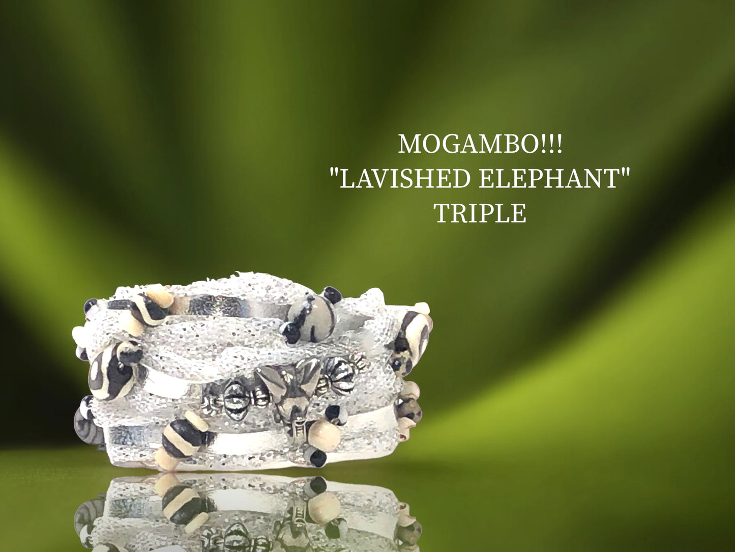 Upscale Elephant-African Themed bracelets for Evening and Cocktails. Beautiful Silver or Gold Triple Wraps w/ delicate Tulle, cascading African Beads and Magnet closure. $40.99