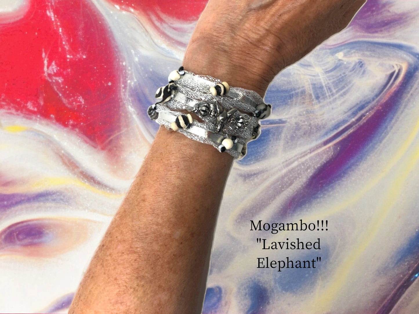 Upscale Elephant-African Themed bracelets for Evening and Cocktails. Beautiful Silver or Gold Triple Wraps w/ delicate Tulle, cascading African Beads and Magnet closure. $40.99