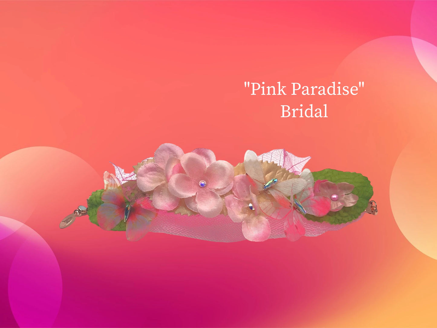 Pink Paradise- lightweight magnetic closure, pink silk flowers with crystal centers Ivory and green silk leaves, 2 chiffon butterflies w/ crystal center, pink skeleton leaves w/ crystal dew drops, delicate tulle, make up this beautiful arm piece. $44.99