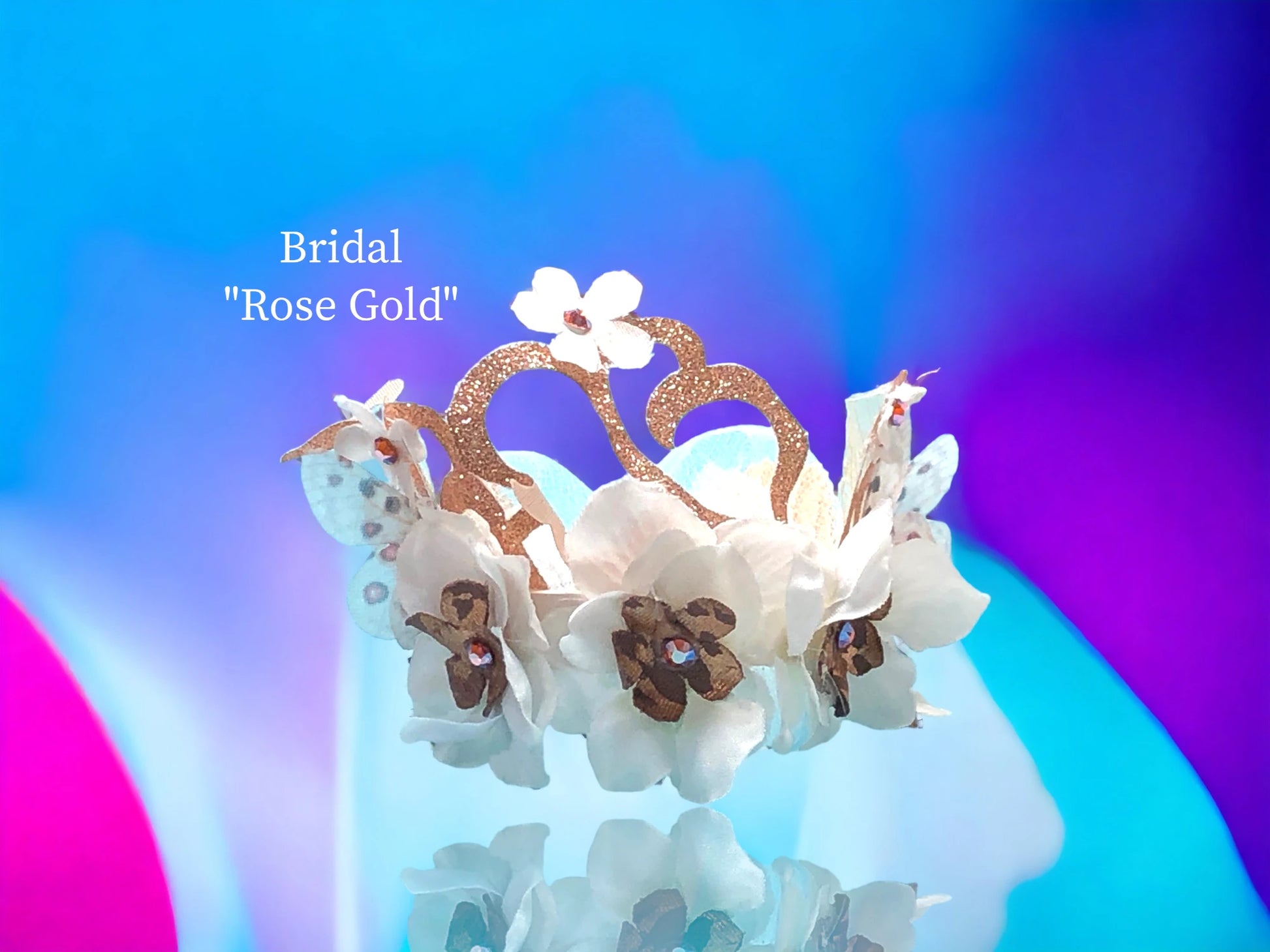 Rose Gold themed w/ satin silk flowers w/ rose gold center w/ Topaz Austrian Crystal, Rose gold sparkle scroll lace, rose gold and white silk flowers w/ Austrian Crystal centers, and 2 delicate 3-D chiffon butterflies adorn this lovely Bridal bracelet. $45.99