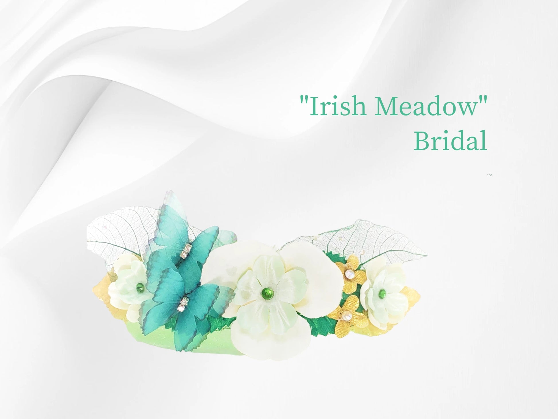 Irish Meadow- Bride's Maid- lightweight with magnetic closure. Beautiful Ivory Orchid, green silk flower, and green Austrian Crystal center. 2 chiffon butterflies, dried baby's breath, delicate green tulle, gold lame' flowers & leaves with Austrian Crystal centers and green skelelton leaves w/ crystal dew drops adorn this beautiful wedding arm piece. $47.99